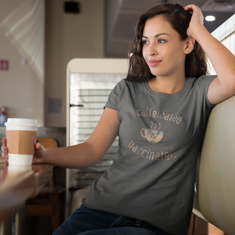 Caffeinated & Vaccinated, Premium Adult Unisex Tee , this kid.activist product gives back to your choice of non-profits!